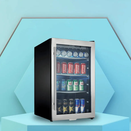 Reversible door beverage refrigerator collection with stainless steel finish and glass door, displaying canned drinks on illuminated shelves.