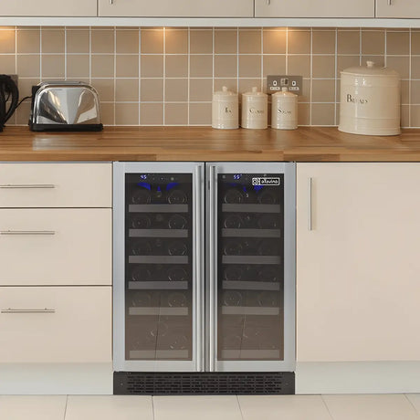 Built-in side-by-side stainless steel wine fridges with glass doors and multiple shelves, integrated seamlessly into a modern kitchen.