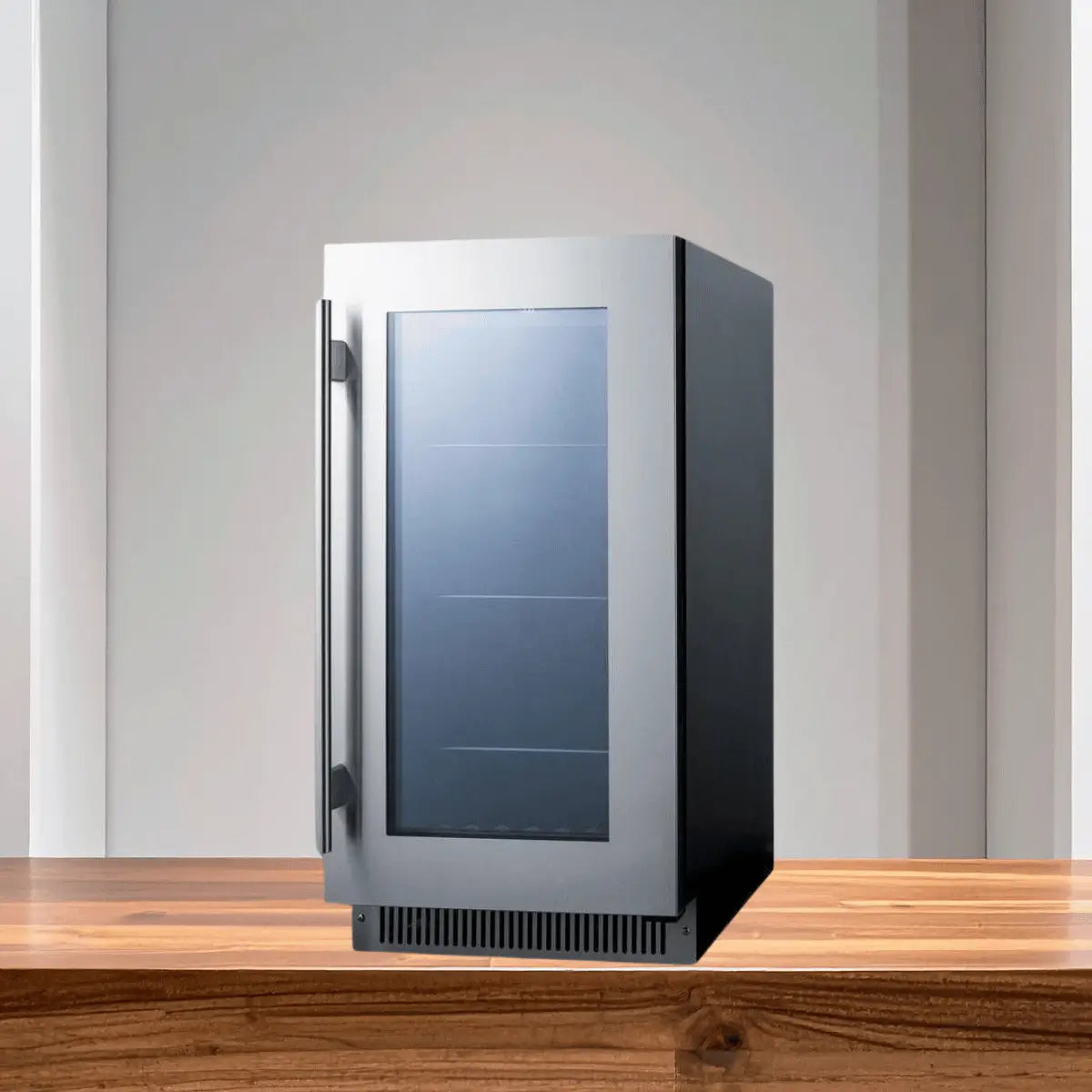 Single-zone beverage refrigerator collection with glass door and stainless steel frame on a wooden countertop.