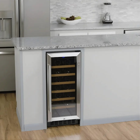 Under-counter stainless steel wine cooler with glass door and wooden shelves built into a modern kitchen island for compact wine storage.