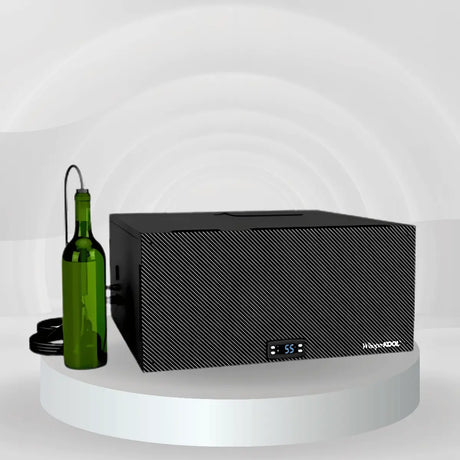 WhisperKOOL cooling unit for 500–1,000 cu. ft. wine cellars with carbon-fiber front, digital display, and bottle probe on a studio platform.