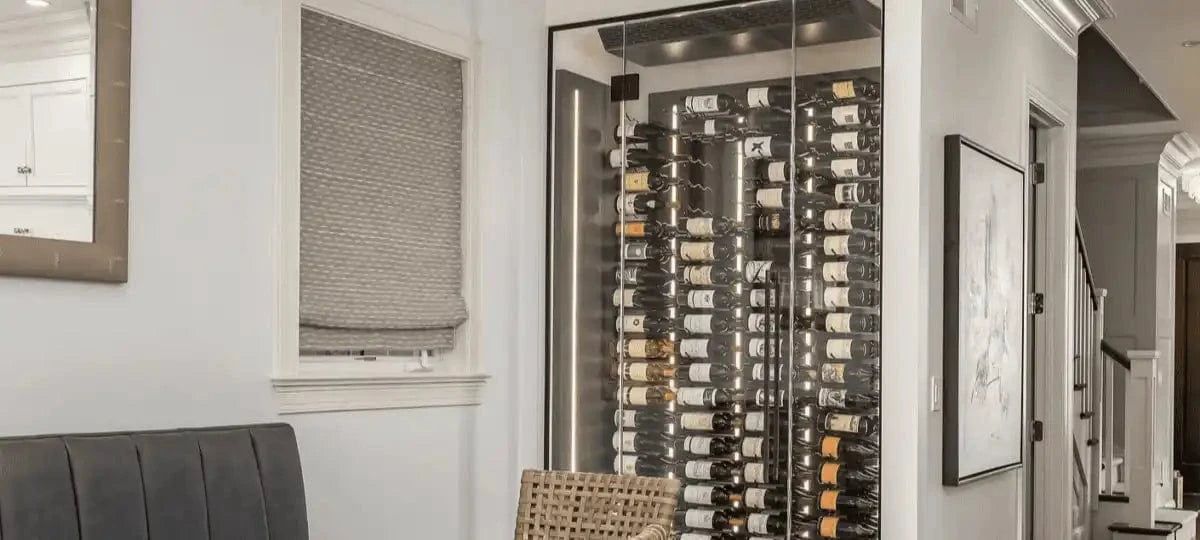 Glass-enclosed wine storage.